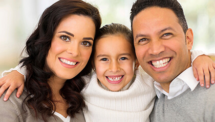 Happy family shares beautiful smiles