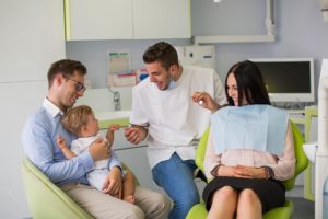 young family at dentist