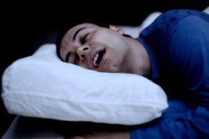 Man sleeping with mouth open.