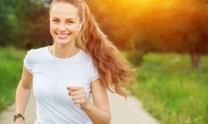 person jogging and smiling