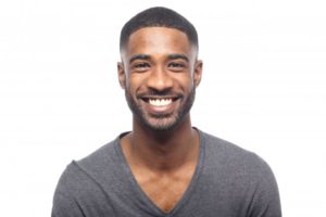 man with white teeth smiling