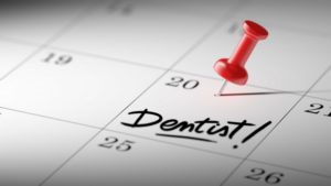 dentist appointment written on calendar