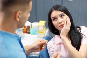 Woman with gum disease visiting dentist