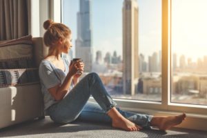 Woman practicing social distancing as recommended by her Melbourne dentist. 