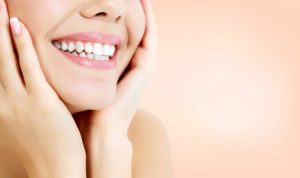 Woman with a beautiful smile from cosmetic dentist in Melbourne. 