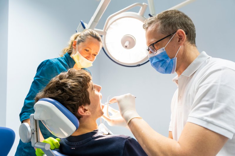 A dentist in Melbourne treating a patient